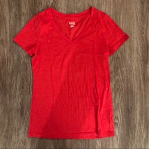 Red v-neck tee.